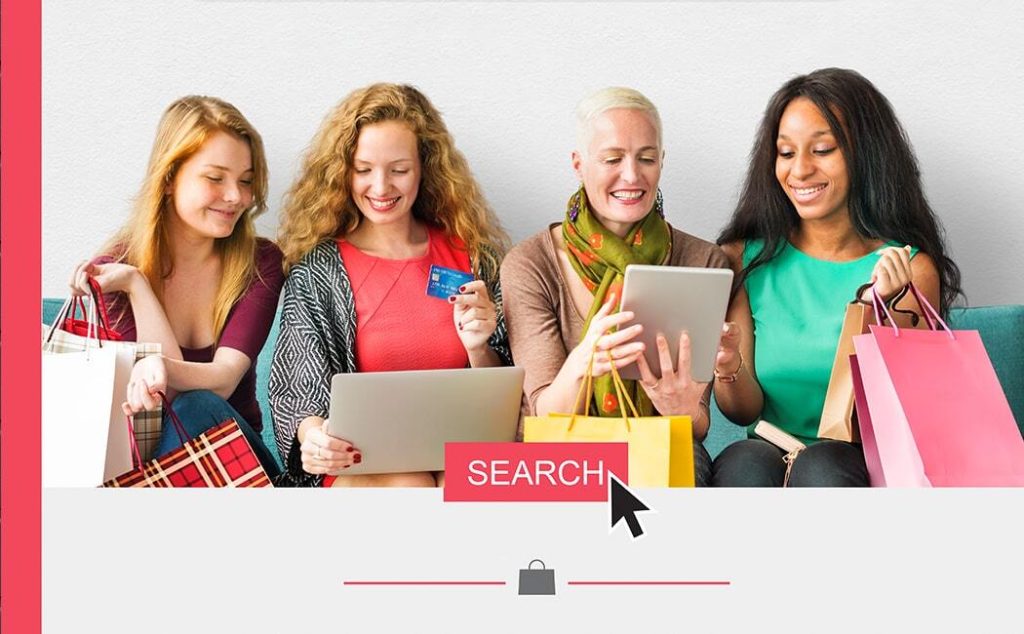 A group of diverse women is shopping online