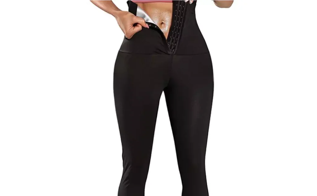 A woman wearing a pair of black shaper leggings